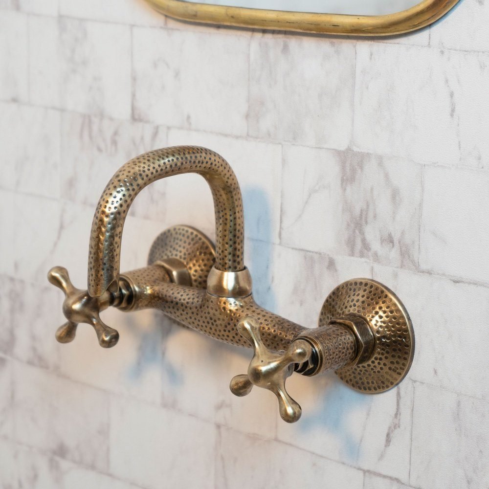 hammered-wall-mount-oil-rubbed-brass-bath-faucet-767288.jpg