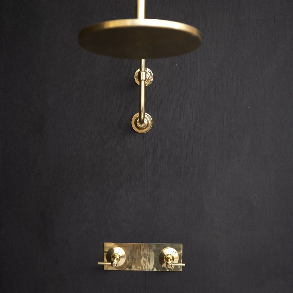 handcrafted-unlacquered-brass-shower-head-with-curved-arm-735886.jpg